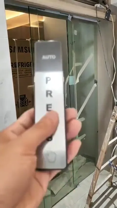 Touchless exit sensor test for an automatic door